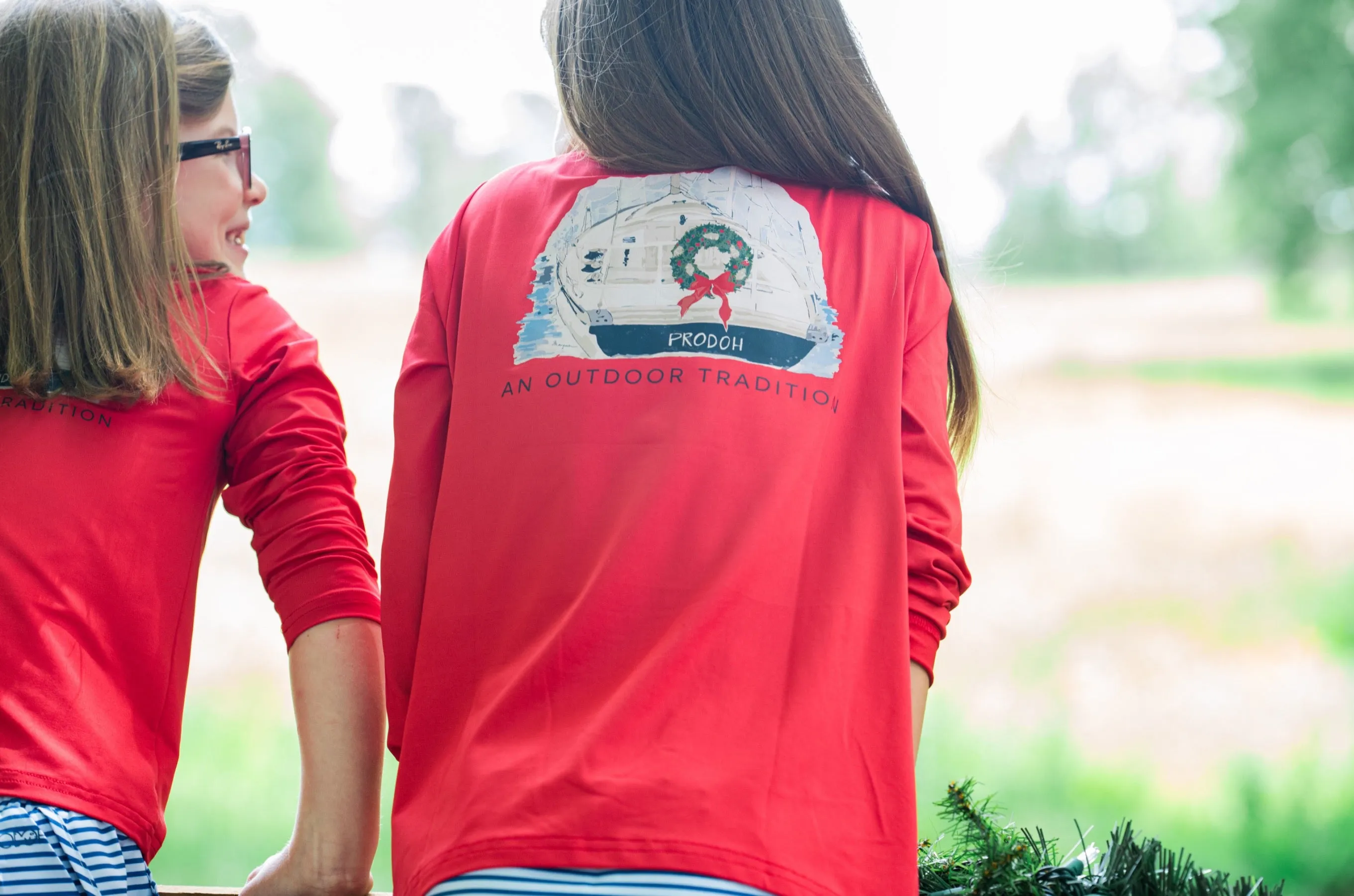 Kid's Pro Performance Long Sleeve Fishing T-shirt with Christmas Wreath on Boat